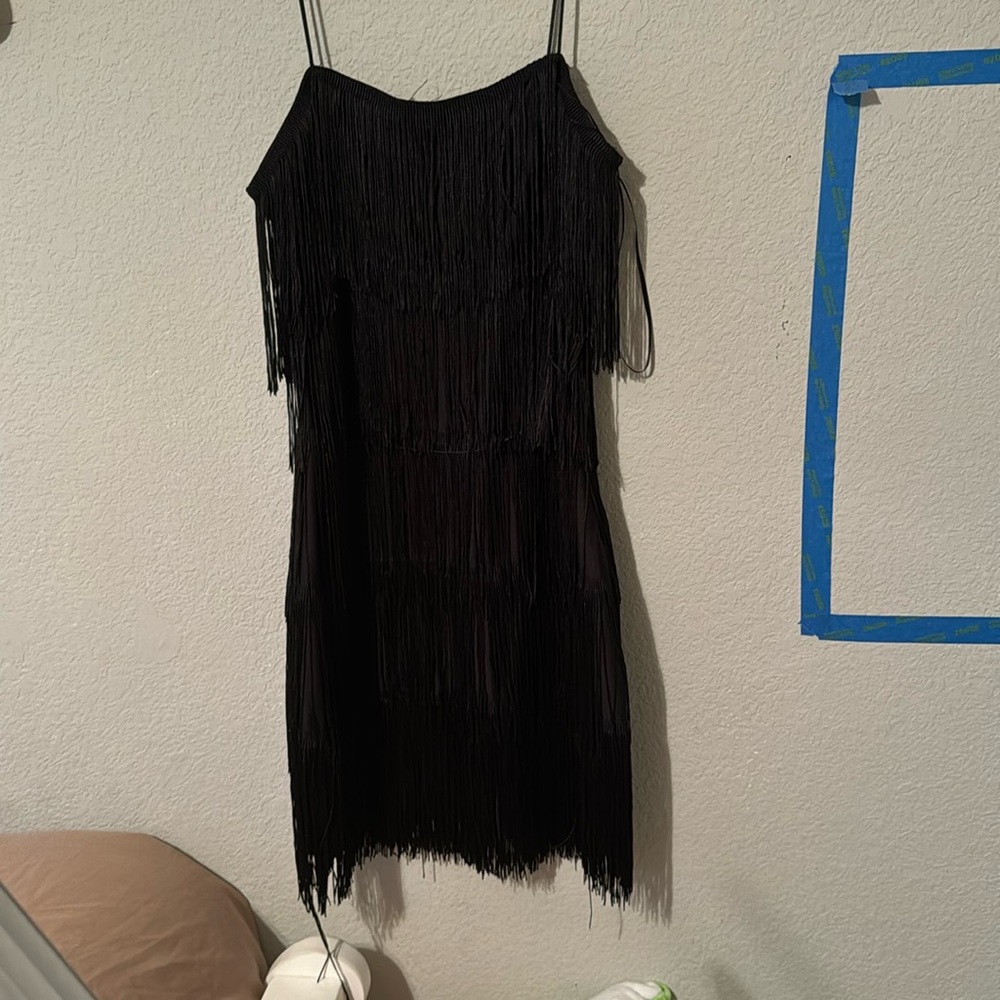 Size small black mini dress with tassels